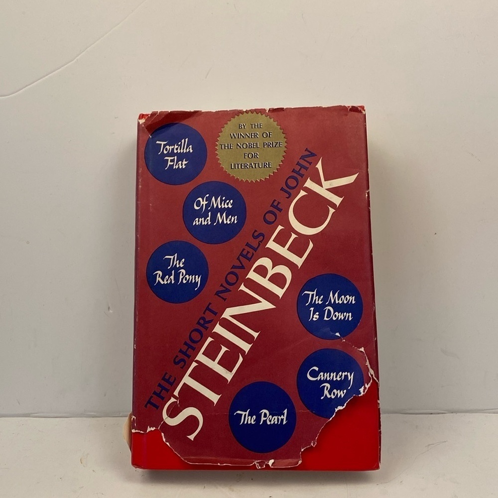 Vintage book the short novels of John Steinbeck of mice and men Cannery Row